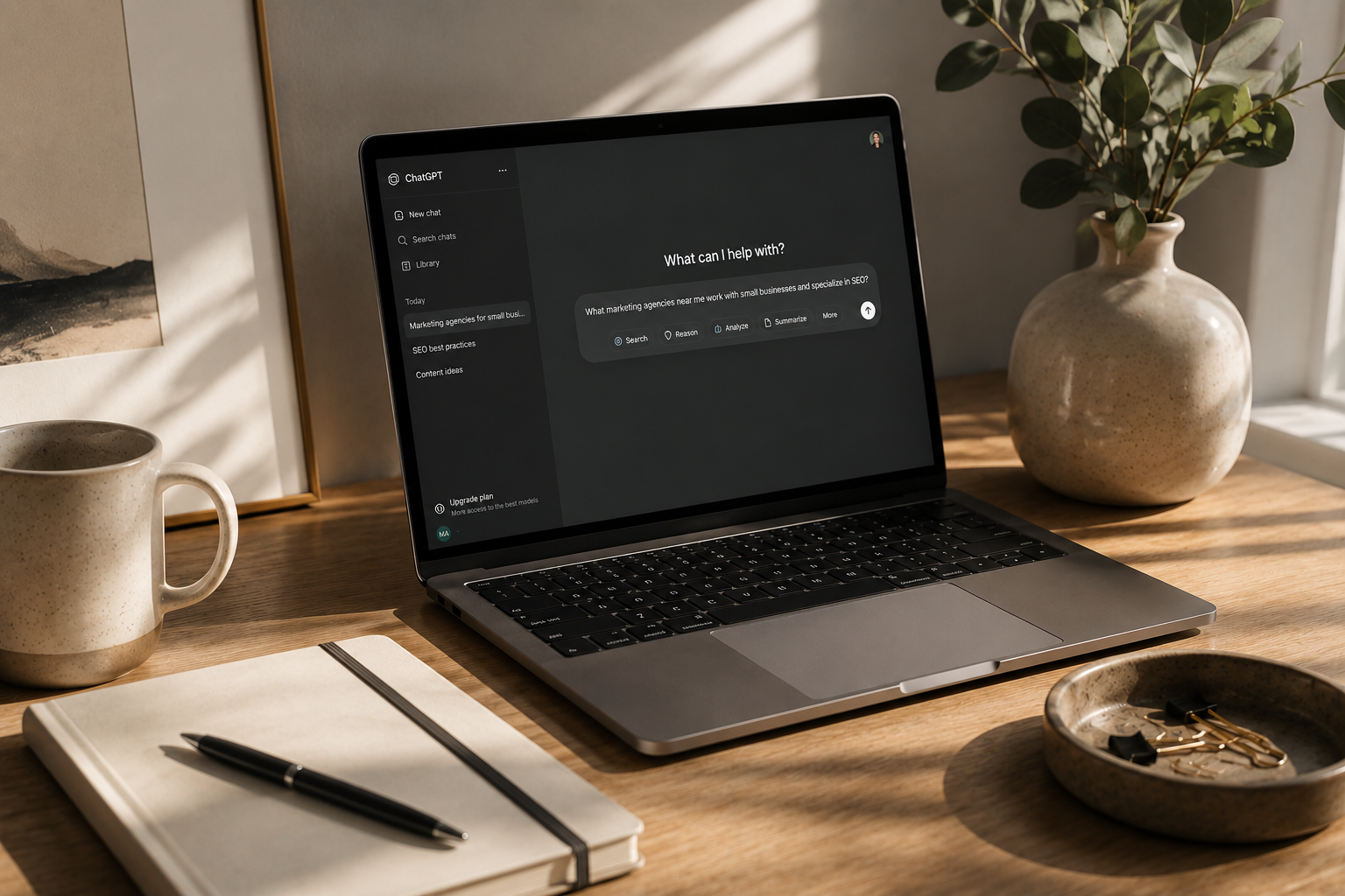 Sunlit Minimalist Workspace with AI Chat Laptop